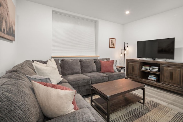 living room featuring recessed lighting and light wood-style flooring