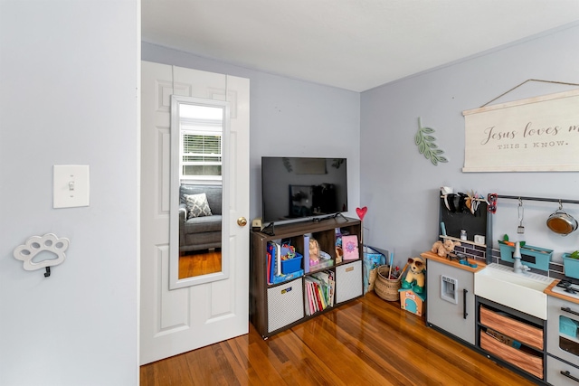 playroom with wood finished floors