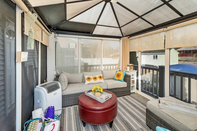 sunroom with lofted ceiling