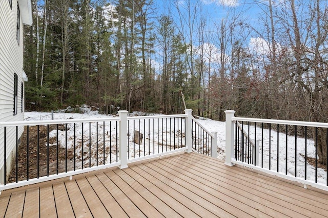 view of snow covered deck