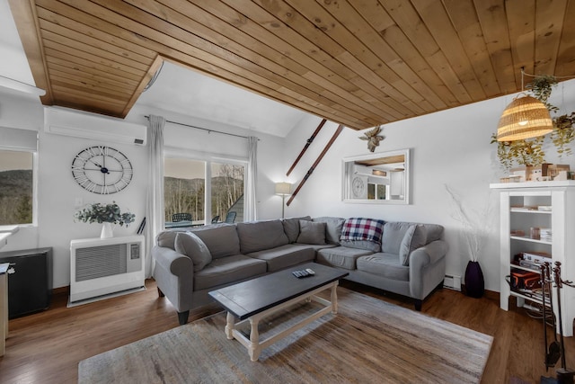 living area featuring a baseboard radiator, wood ceiling, a wall unit AC, and wood finished floors