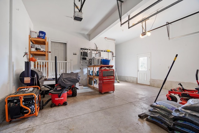 garage featuring a garage door opener