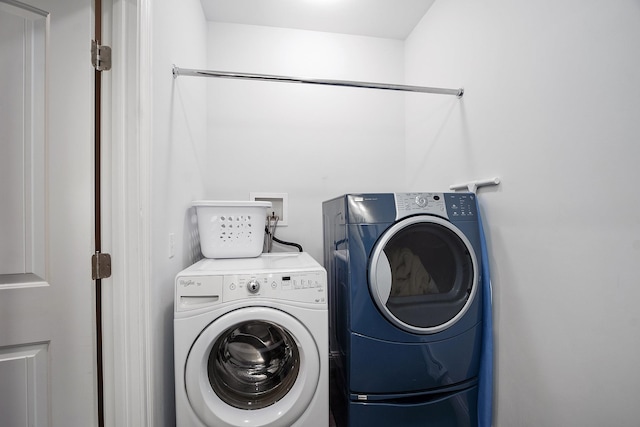 laundry area featuring independent washer and dryer and laundry area