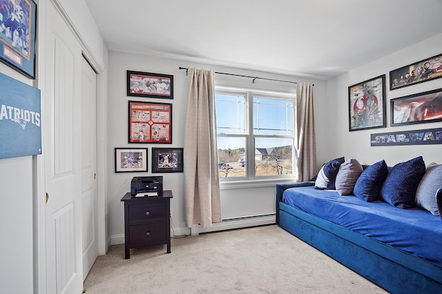 living room with a baseboard heating unit and carpet floors