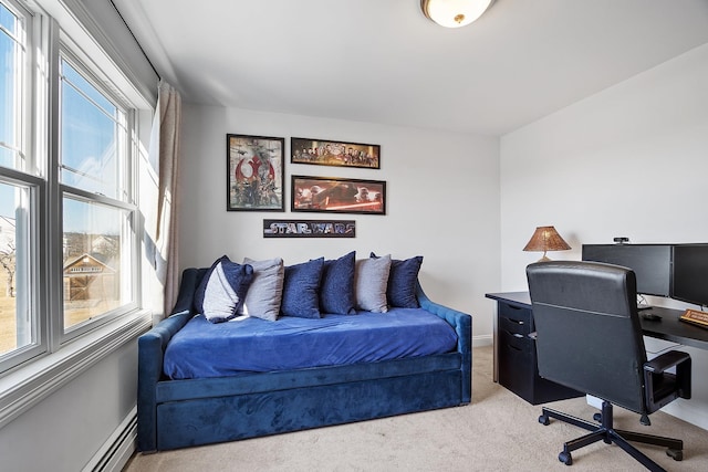 office featuring a wealth of natural light, light colored carpet, a baseboard heating unit, and baseboards