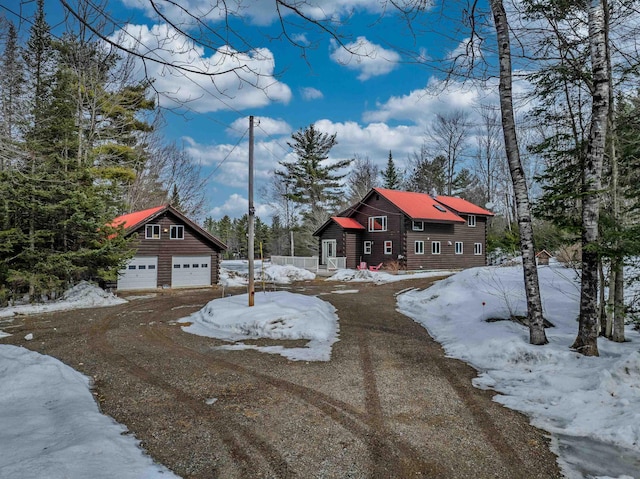 rustic home with an outbuilding