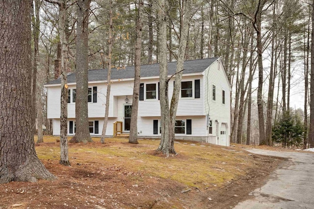 raised ranch with an attached garage