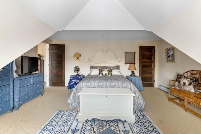 bedroom with a baseboard heating unit, lofted ceiling, and carpet