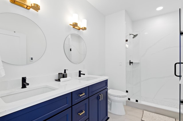 bathroom featuring a sink, a marble finish shower, toilet, and double vanity