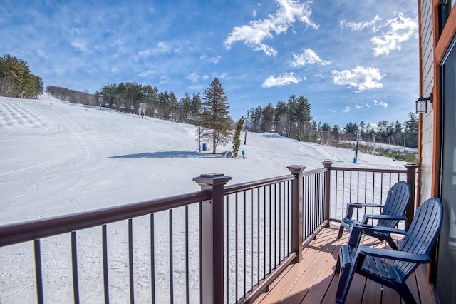 view of snow covered deck