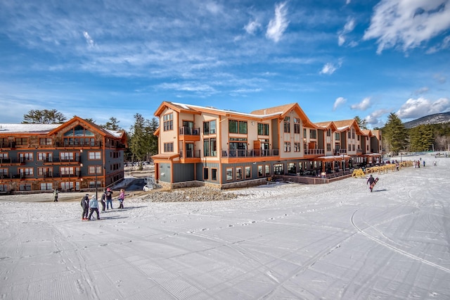 view of snow covered property