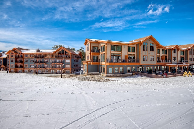 view of snow covered property