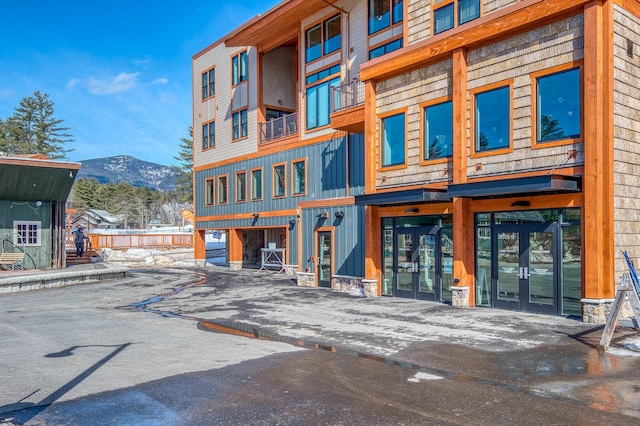 view of building exterior featuring a mountain view