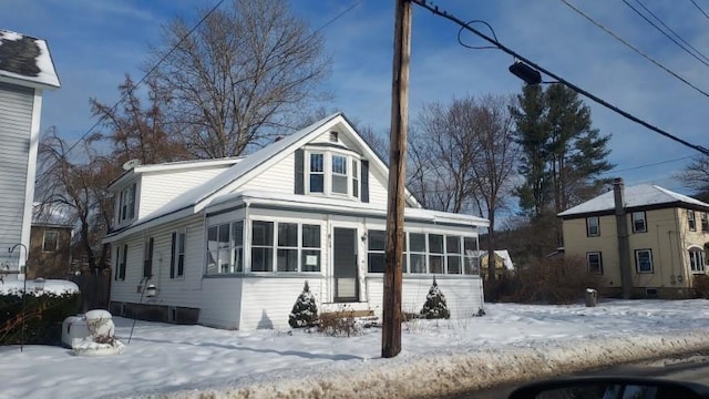 view of front facade featuring a sunroom