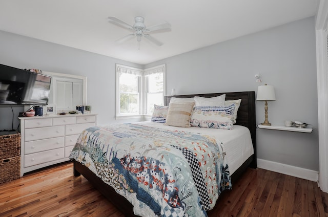 bedroom with baseboards, a ceiling fan, and light wood finished floors