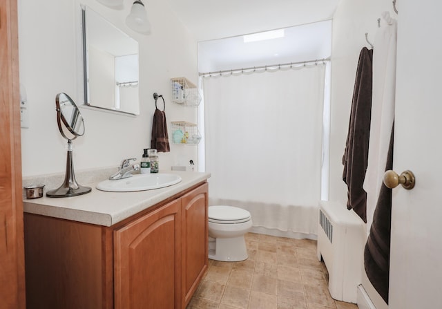 full bath featuring radiator, shower / bath combination with curtain, vanity, and toilet