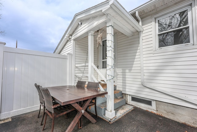 view of patio / terrace featuring fence