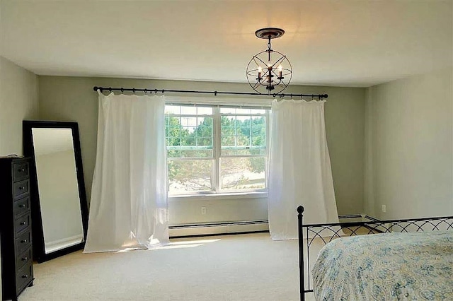 bedroom featuring a baseboard heating unit, carpet floors, and a chandelier