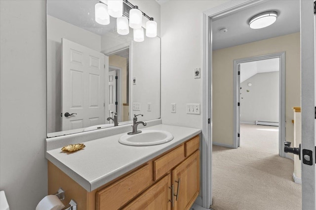 bathroom featuring a baseboard radiator and vanity