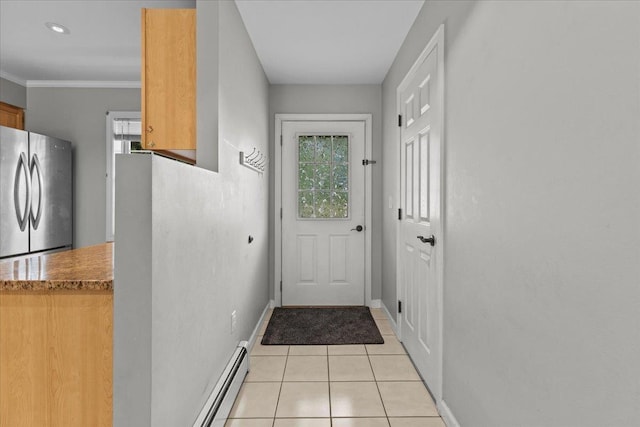 doorway featuring light tile patterned floors, crown molding, a baseboard heating unit, and baseboards