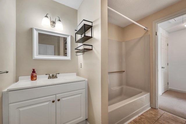 full bathroom with vanity, tile patterned floors, and bathing tub / shower combination