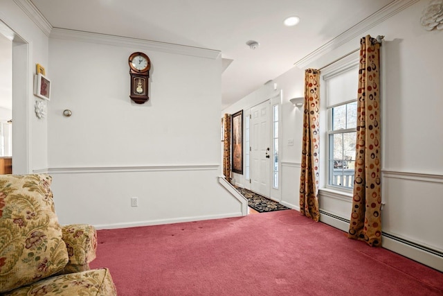 carpeted entryway with recessed lighting, a baseboard radiator, baseboards, and ornamental molding