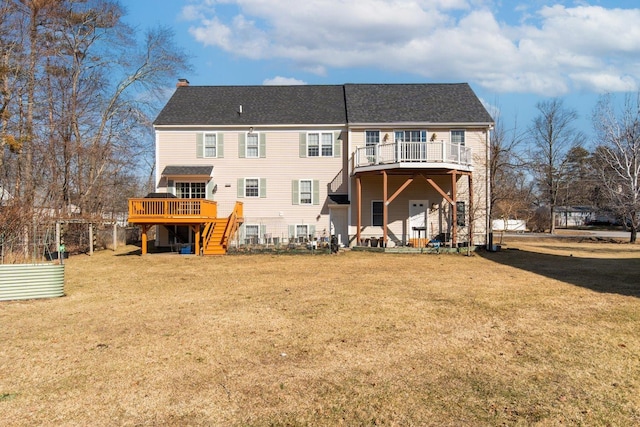 back of property featuring a yard, roof with shingles, and a chimney