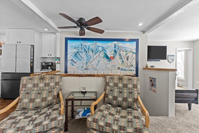 sitting room featuring carpet flooring, recessed lighting, and ceiling fan