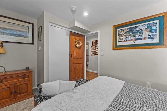 bedroom with recessed lighting and baseboards