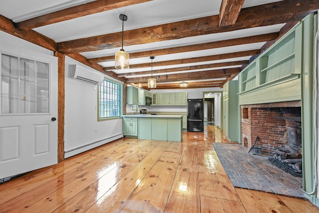 kitchen featuring a wall mounted air conditioner, black appliances, light wood finished floors, green cabinetry, and a baseboard radiator