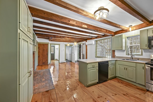 kitchen with a sink, black appliances, a wall mounted AC, and green cabinetry