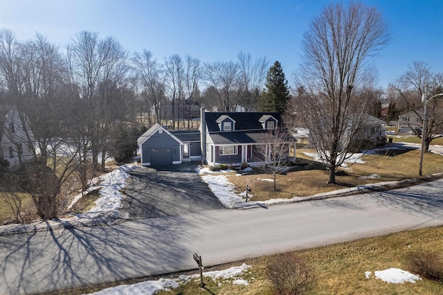 view of front of home featuring a garage and driveway