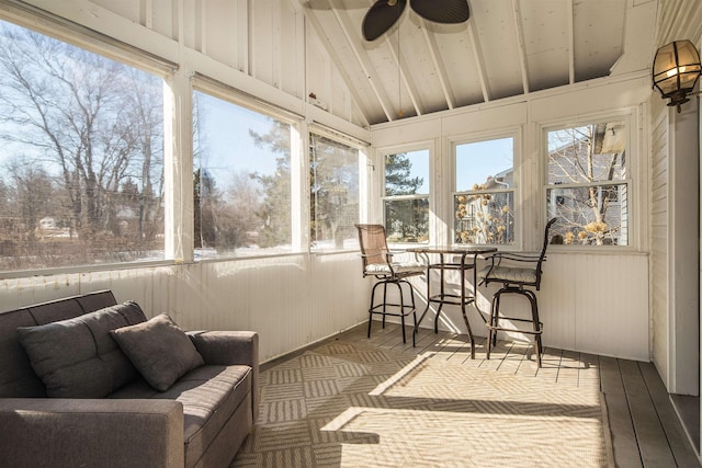 sunroom / solarium with vaulted ceiling and ceiling fan