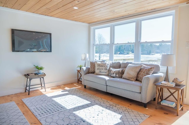 living area featuring light wood-style flooring, wooden ceiling, and baseboards