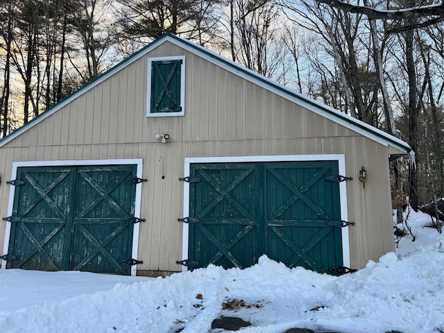 view of snow covered garage