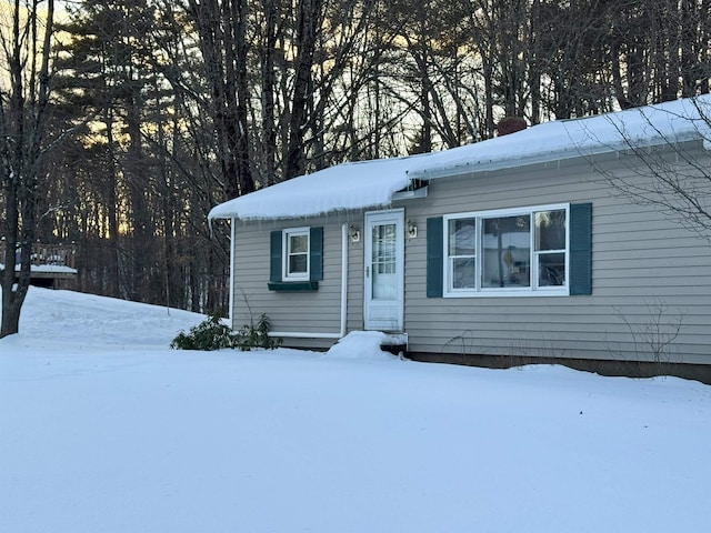 view of front of property featuring a chimney