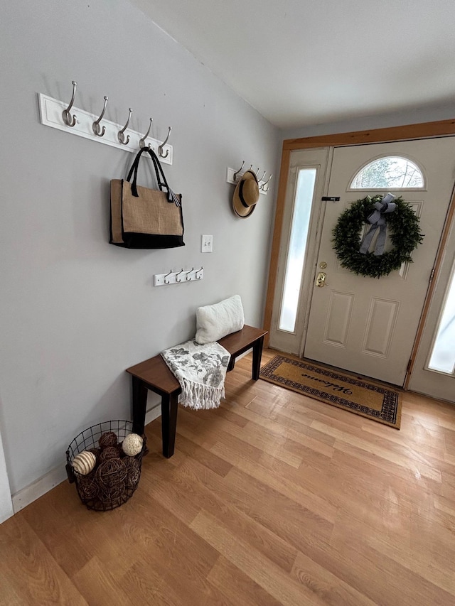 entryway with light wood-style floors