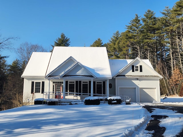 view of front of home featuring a garage and driveway