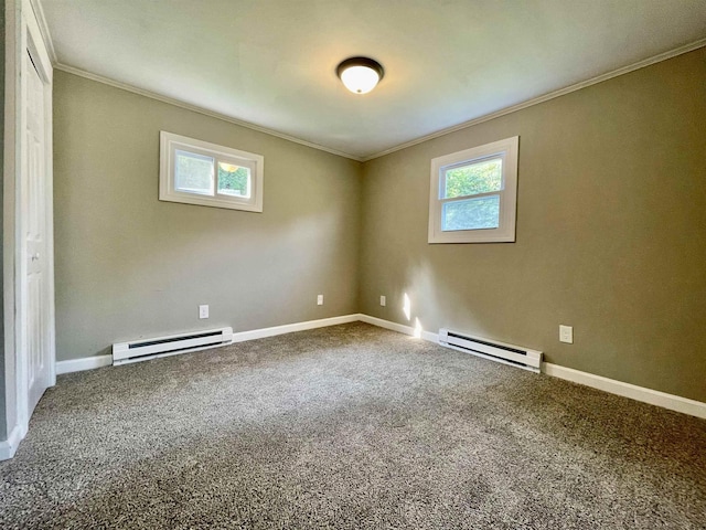 unfurnished room featuring baseboard heating, a healthy amount of sunlight, and carpet
