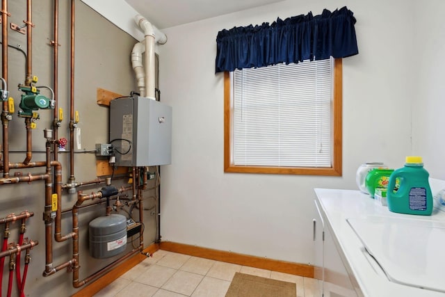 utilities featuring water heater and a sink