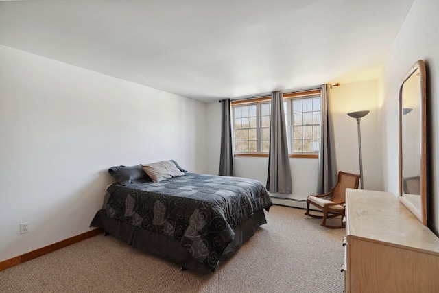 bedroom featuring light carpet and baseboards