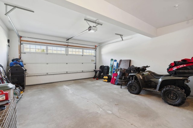 garage featuring a garage door opener