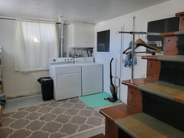 laundry area featuring cabinet space and independent washer and dryer