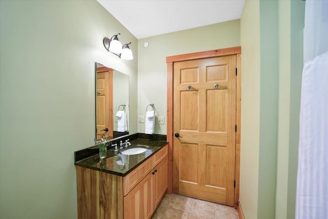 bathroom featuring tile patterned floors and vanity