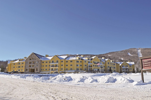 view of snow covered property