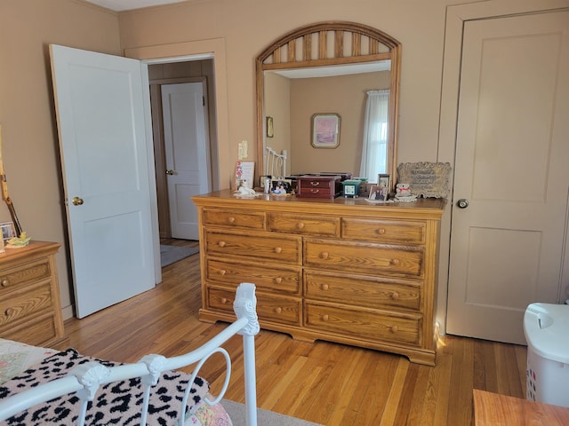 bedroom with light wood-type flooring