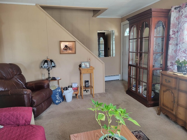 living room featuring baseboard heating, ornamental molding, stairs, and carpet floors