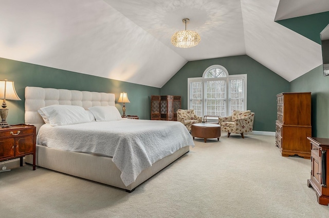 bedroom featuring light carpet, baseboards, and vaulted ceiling