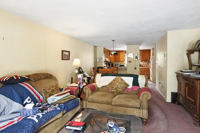 living area featuring carpet flooring