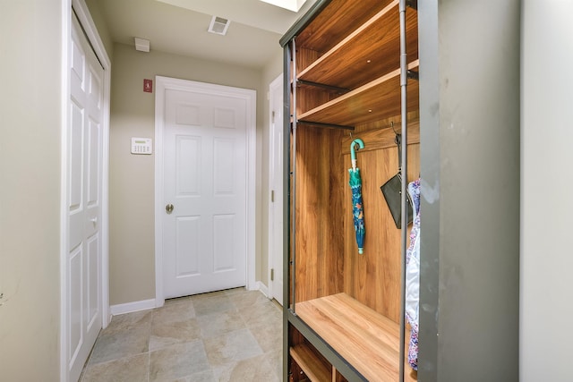 mudroom featuring visible vents and baseboards